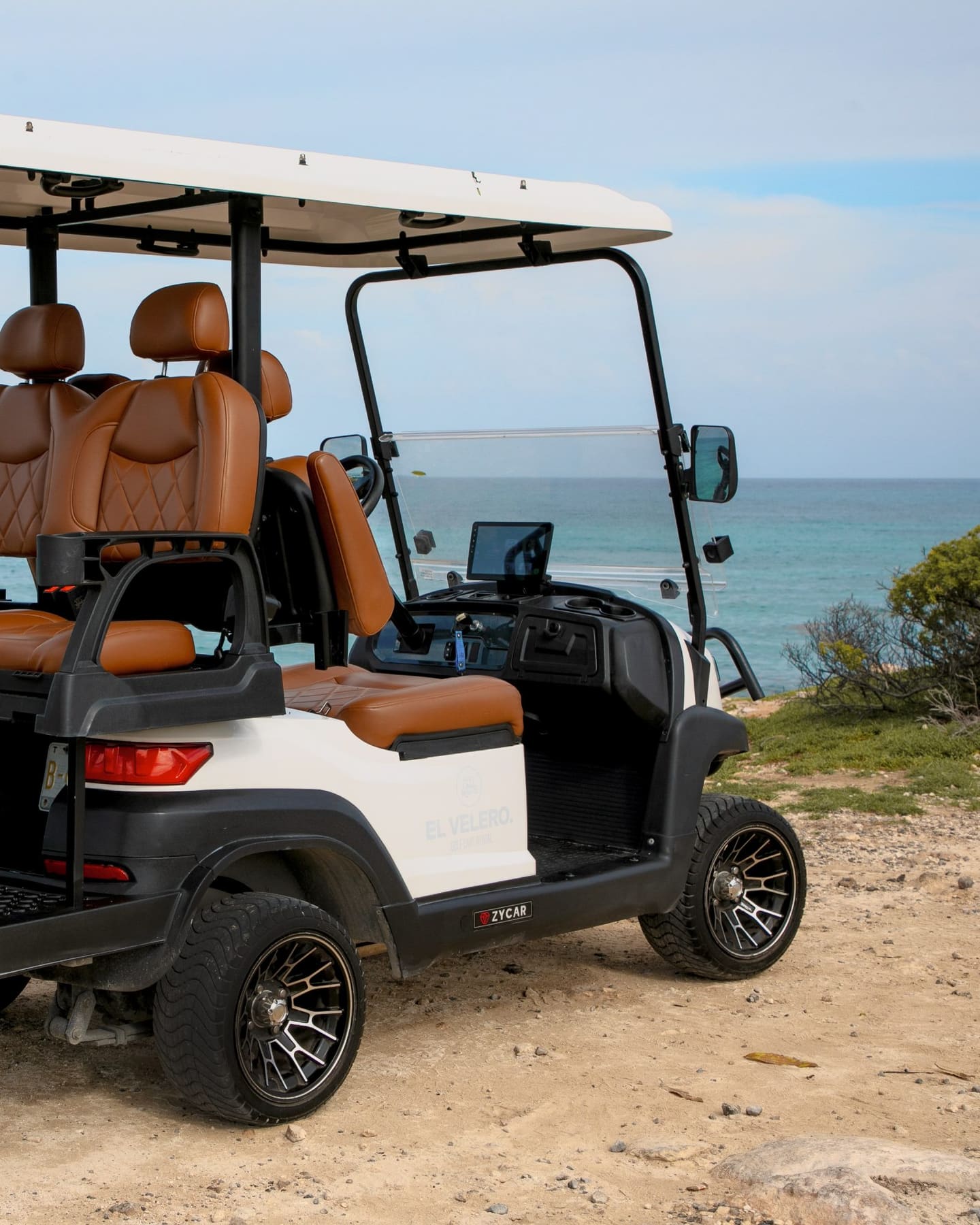 Golf cart by the sea